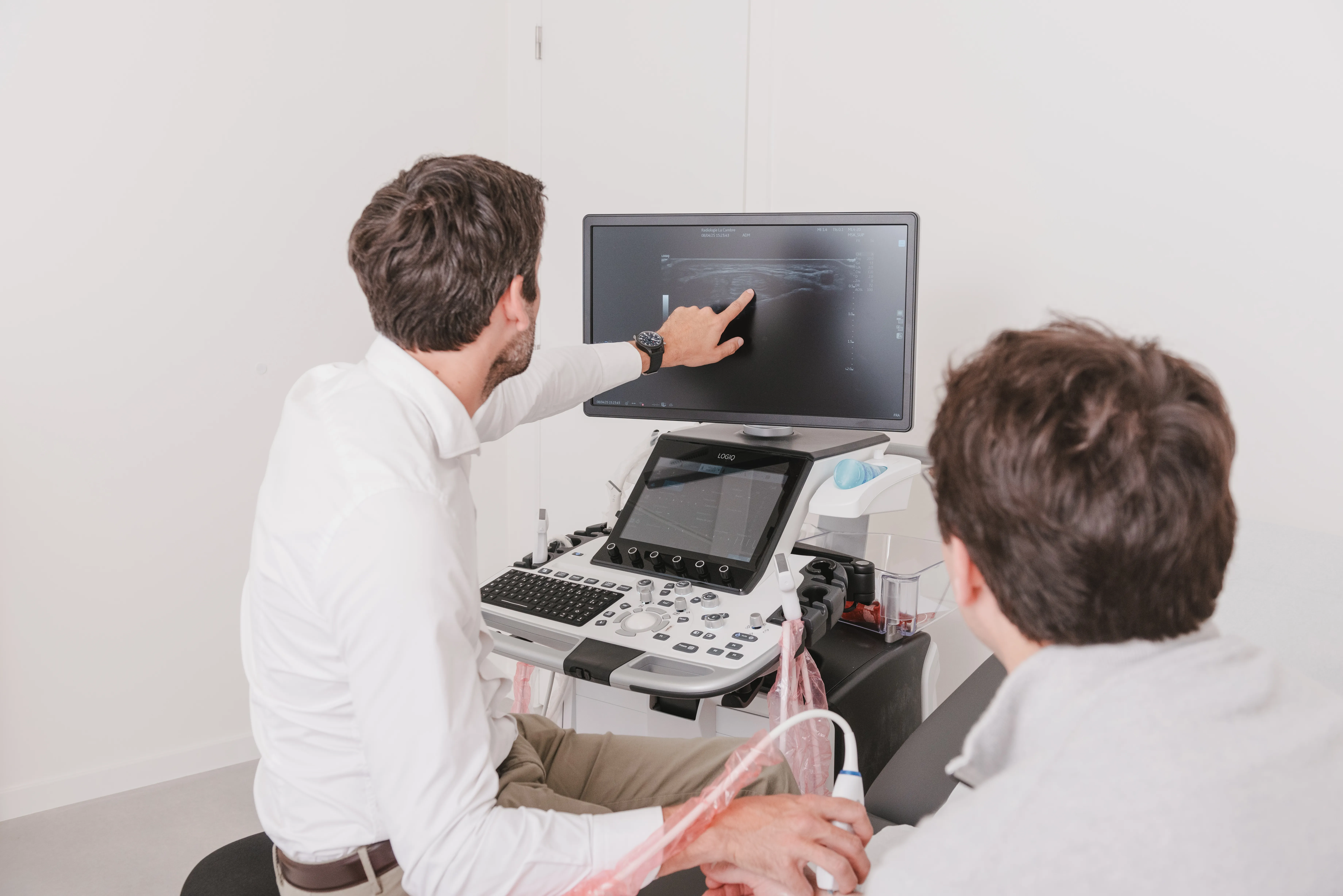 Radiologists reviewing ultrasound imaging together